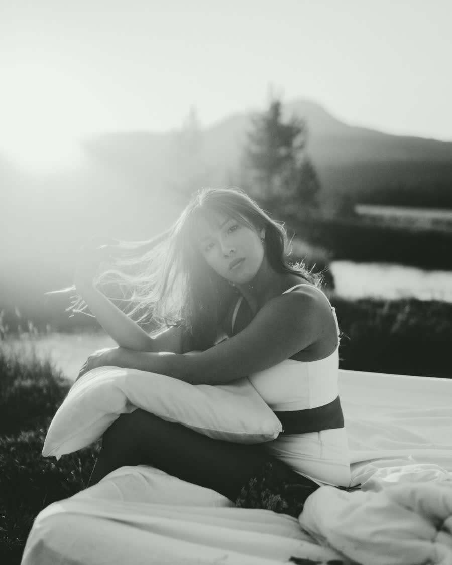 Annie at golden hour in an alpine meadow, black and white