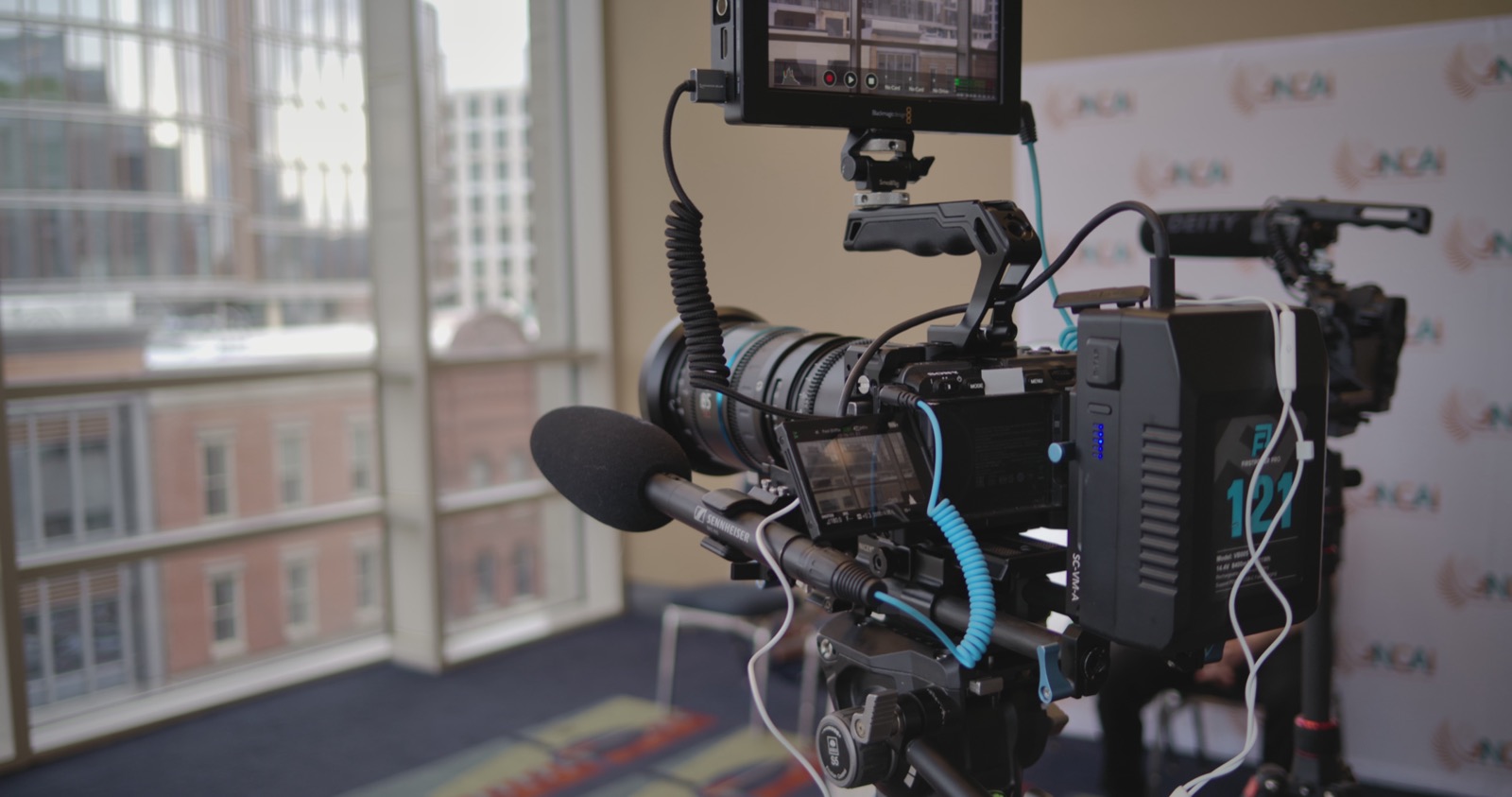 A full cinema rig set up in a conference room