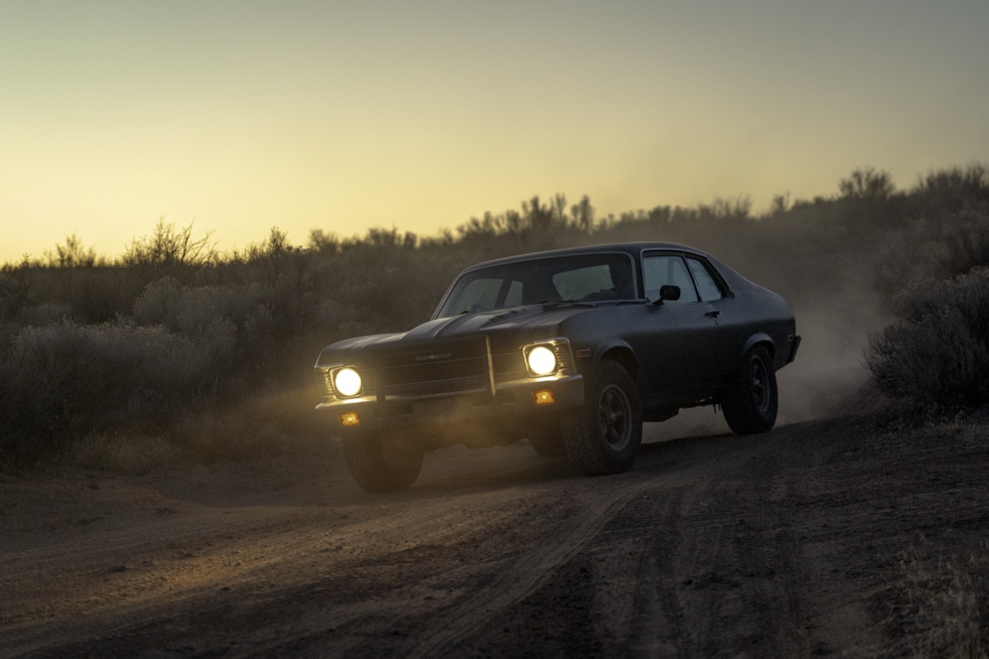 Front three-quarter view of the car in fading dusk glow